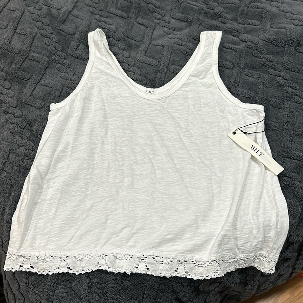 Women’s white tank top w/ detailed trim.  NWT, smoke free home